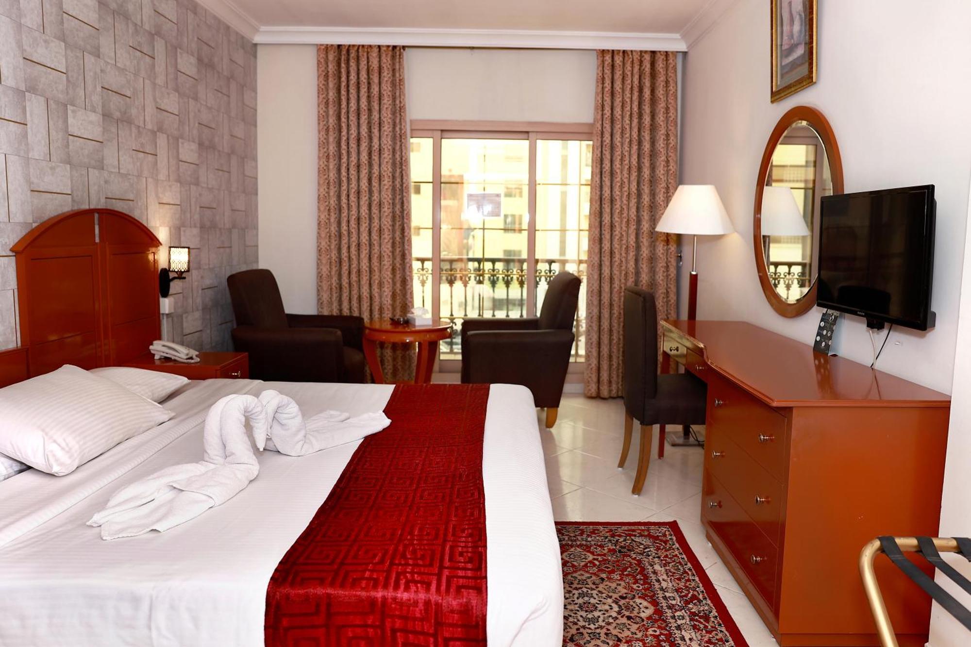 Dolphin Hotel Apartments Дубай Экстерьер фото